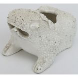 A rare Derby white glazed porcelain posey holder in the form of a toad, Sampson Hancock period.