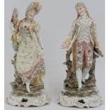 A large pair of German Triebner, Ens & Eckert figurines of a lady and gentleman, 19th century.