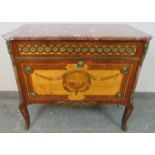 A vintage French kingwood commode chest in the 18th century taste housing three long graduated