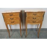 A pair of vintage French tulipwood ormolu mounted bedside cabinets, with white marble tops, each