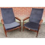 A pair of mid-century hardwood ‘Manhattan’ reclining armchairs by Guy Rodgers, upholstered in