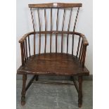 An 18th century elm stick-back Windsor chair, on turned canted supports with an ‘H’ stretcher. H96cm