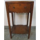 An Edwardian Georgian Revival oak side table, with single drawer and shaped apron, on square