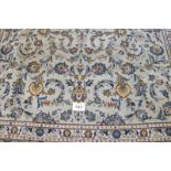 Central Persian Kashan carpet, heavy floral pattern on a pale blue field and extra wide borders. 395