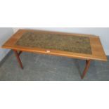 A mid-century teak rectangular coffee table, attributed to Johannes Andersen for PBS, with inset