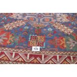 A 20th century Kashqai (tribal) carpet, central small square motif, (see images) on blue ground with