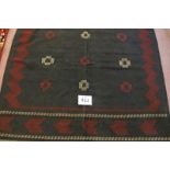 North East Persian Sofreh Kilim, 9 central motifs on a black ground, highlighted with cream and red.