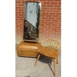 A mid-century blonde elm Windsor cheval mirror by Ercol, on a box base housing one long drawer,