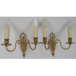 A pair of Neo Classical revival cast gilt-metal twin-branch wall lights. (2 items) 23 cm height.