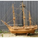 A large carved wood model of a galleon ship, late 20th century. 121 cm height on stand. Condition