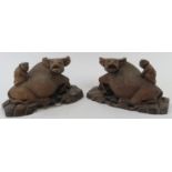 A pair of Chinese carved hardwood buffalo groups, early 20th century. Both carved depicting a figure
