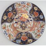 A Japanese Imari charger, late Meiji/Taisho period. Polychrome enamelled with gilt highlights. 35.