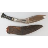 A kukri knife, late 19th/early 20th century. With a horn handle and leather scabbard. Probably