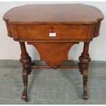 A 19th century burr walnut writing table by Marvin cabinet makers, London, the lid opening onto a