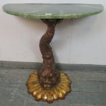 A vintage Demilune console table in the Venetian taste with faux marble top on an ornate gilt base