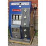 A vintage Jubilee one-armed bandit penny slot machine. Includes coins.