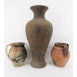 Three antique Mediterranean pottery wares. Comprising a large ceramic vase together with two