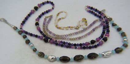 A delicate necklace of citrine, amethyst & pearls with yellow metal spacers on a 14ct three coloured
