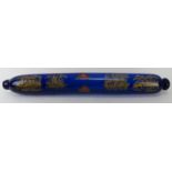 A large Victorian sailors forget-me-not Bristol blue glass rolling pin. With transfer printed and