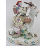 A European porcelain figural group of The Welsh Tailor's Wife riding a goat with her young, late