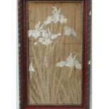 A Chinese embroidered silk panel depicting a bird amongst Iris flowers, early 20th century. Framed