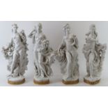 A large set of four Royal Worcester porcelain ‘Four Seasons’ maiden figurines by Sir Arnold