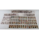 A collection of vintage British famous footballers cigarette cards, circa 1930s. Cards issued by