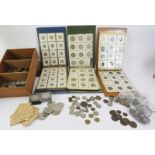 A large collection of old English coinage mainly in three albums of old shillings, half crowns and