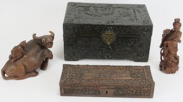 A group of Chinese and Indian carved items, 20th century. Comprising a Chinese carved hardwood