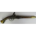 A flintlock brass mounted wood and iron holster pistol, late 17th/early 18th century. 46.8 cm