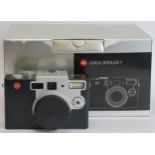 A Leica Digilux 1 7-21mm camera. Complete with box, carry strap and charger. Condition report: