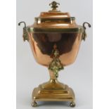 A brass and copper twin handled hot water samovar urn and cover, 19th century, probably late