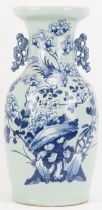 A Chinese twin handled baluster porcelain vase, late 19th/early 20th century. Modelled with