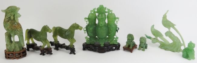 A group of Chinese jade, hardstone, mineral carvings and glass cat, 20th century. (8 items) Bird