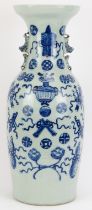 A large Chinese twin handled baluster porcelain vase, late 19th/early 20th century. Modelled with