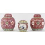 Two Chinese famille rose polychrome painted porcelain ginger jars and covers together with a jar and