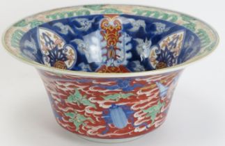 A Japanese Arita porcelain wear bowl, 19th century. Six character mark in underglaze blue beneath (