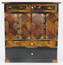 A Japanese parquetry inlaid and gilt lacquer decorated table top cabinet, Meiji period. With