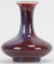 A Chinese flambé glazed porcelain vase, late 20th century. 16 cm height. Condition report: Light