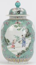 A Chinese famille rose porcelain vase and cover, probably mid/late 20th century. Of ovoid form