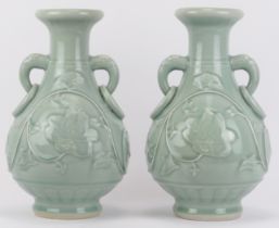 A pair of Chinese celadon glazed porcelain twin handled vases, late 20th century.