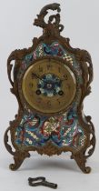 A French champlevé enamelled mantle clock by Pailthorp of Paris, 19th century.