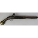 A flintlock brass mounted wood and iron holster pistol, late 17th/early 18th century. 49.5 cm