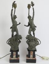 A pair of neo-classical cast spelter figural table lamps, early 20th century. Both spelter figures