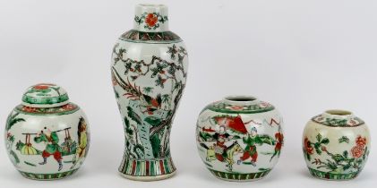 Four Chinese famille verte porcelain ginger jars and a vase, late 19th/early 20th century.