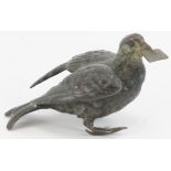 An Austrian cold painted bronze pigeon carrying a letter. Signed ‘Geschutz’ to a tail feather. 9.5