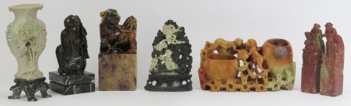 A group of Chinese hardstone and soapstone carvings, 20th century. (6 items) Vase on stand: 20.4