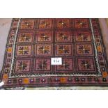 A mid 20th century Persian rug. Repeat central pattern. 188cm x 104cm. Condition report: Wear to one