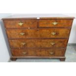 An early 18th century burr walnut inlaid and crossbanded chest, housing two short over three long