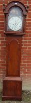 A 19th century mahogany cased 8-day striking longcase clock by Logan of Dorchester, the arched